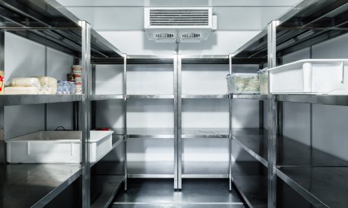 refrigerator-chamber-with-steel-shelves-restaurant-close-up-min